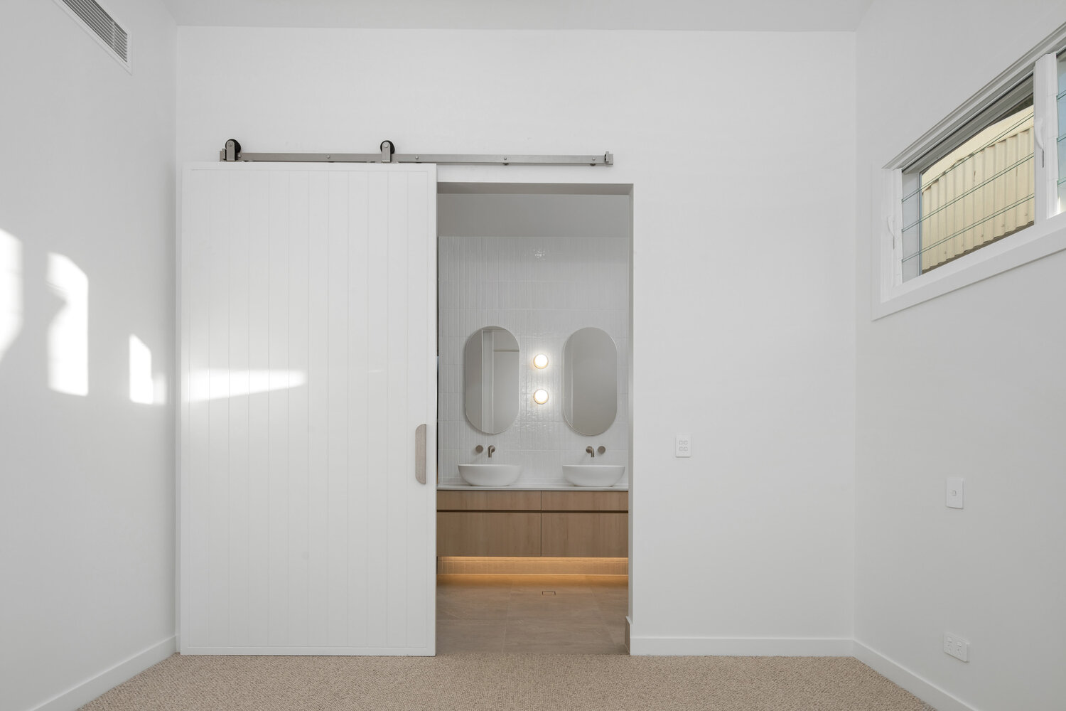 Bathroom in soft neutral tiles