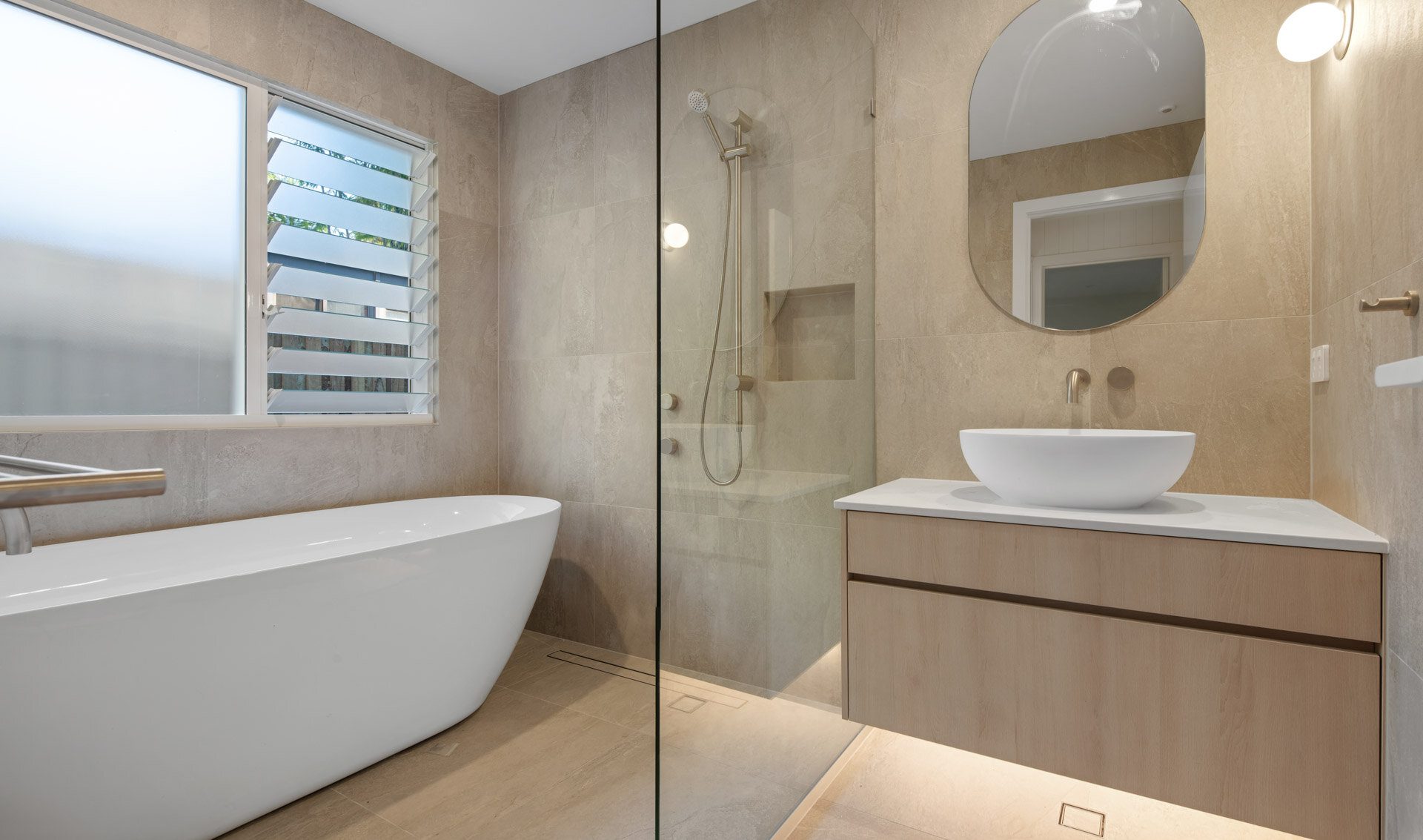 Living and dining with continuous stone floor