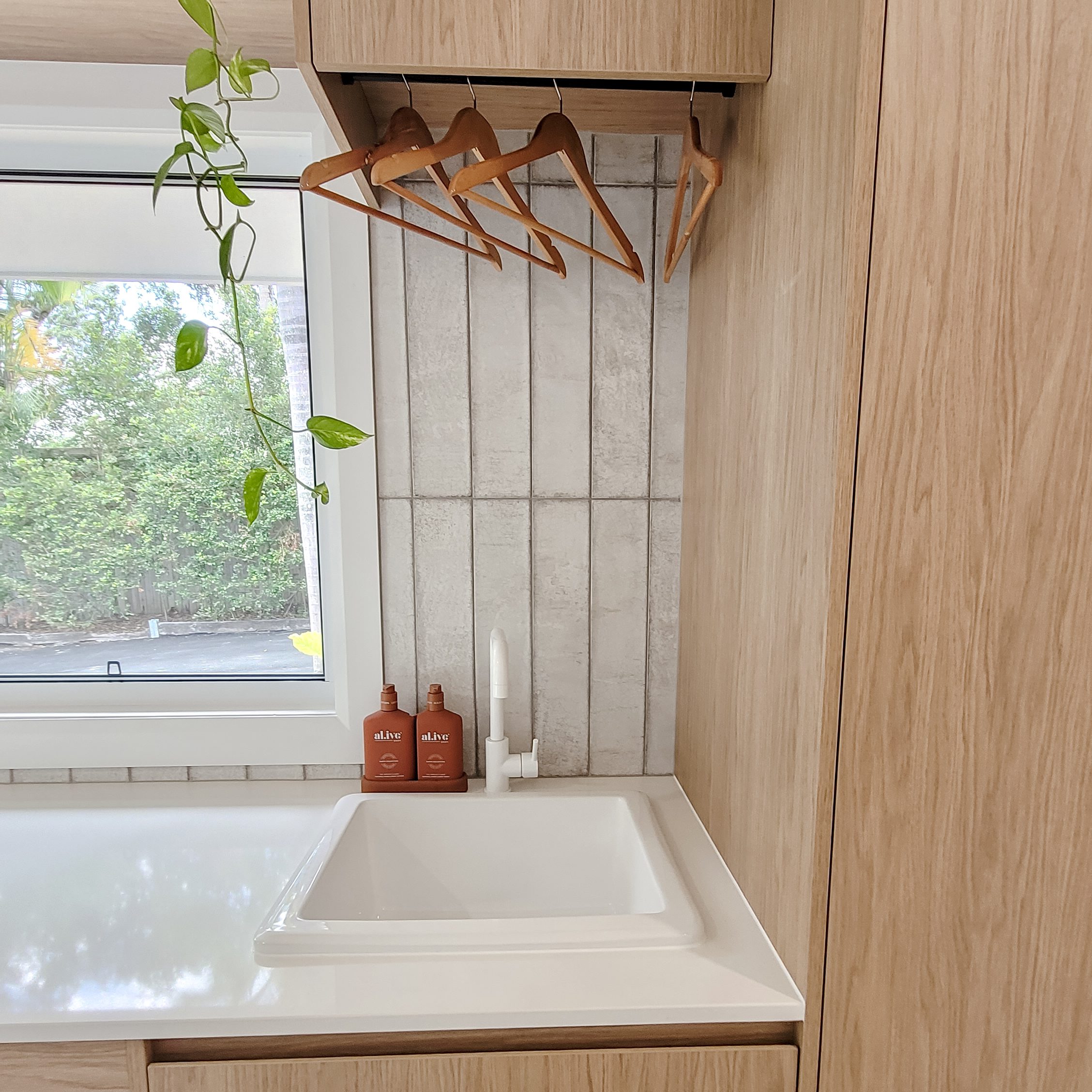 Family bathroom with matte-black fixtures